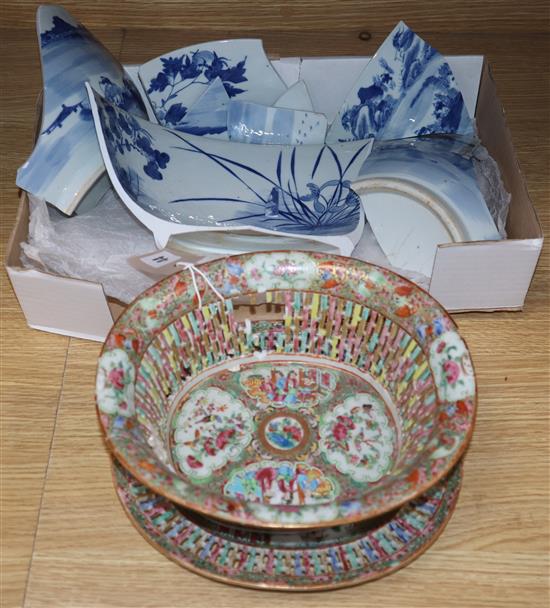 A Chinese famille rose basket and stand and a blue and white bowl, both a.f.